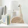 wood rainbow stacking toy in nursery